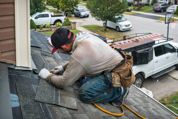 Professional Roofing technician working in Highlands, TX